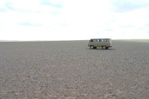 The tour van stopped on the steppe
